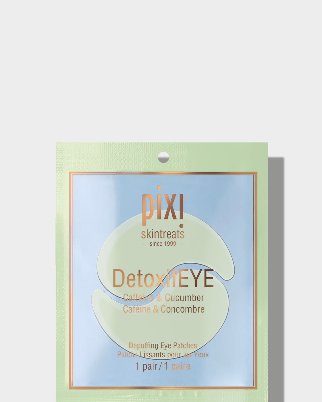 Saszetka Pixi Skintreats DetoxifEYE zawiera parę płatków pod oczy z kofeiną i ogórkiem, które redukują opuchliznę i odświeżają skórę.