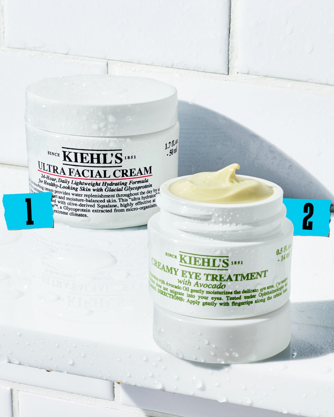 Voici le pot blanc de crème pour le visage Kiehl's Ultra Facial Cream, une formule hydratante légère pour une peau d'apparence saine.