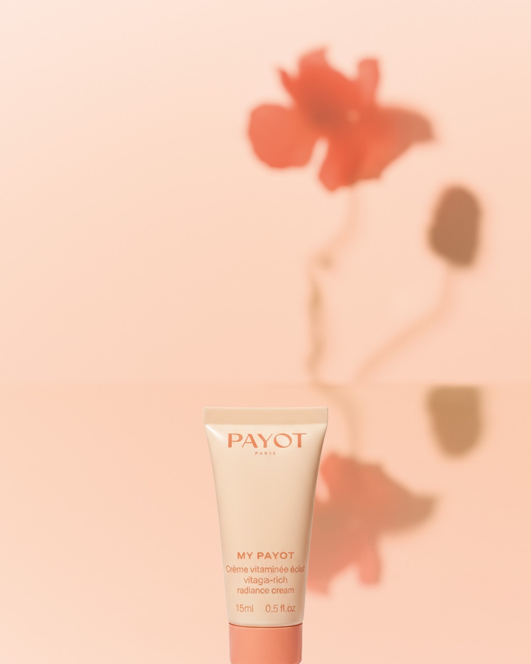 Krem Payot My Payot Crème Vitaminée Éclat w tubce w odcieniach brzoskwini, zapewniający promienność skóry, o pojemności 15 ml.