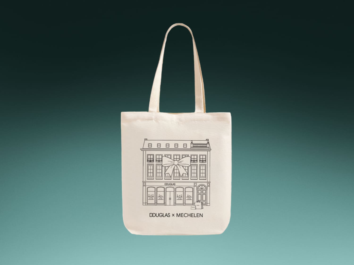 Ecru katoenen tas met lange hengsels, versierd met een zwart-wit illustratie van het Douglas-gebouw in Mechelen, compleet met een feestelijke strik.