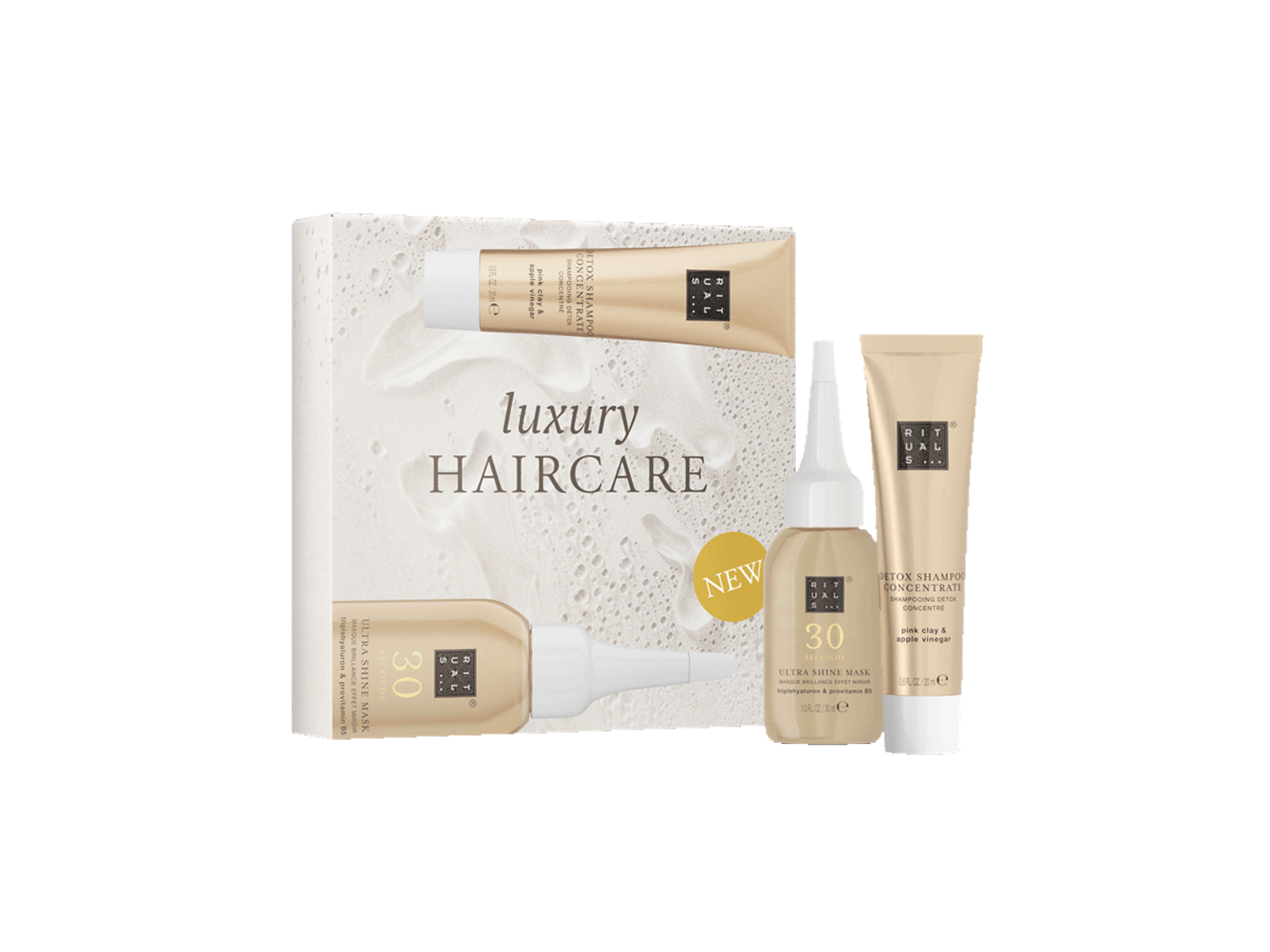 Le coffret de luxe pour les soins capillaires de Rituals comprend un masque ultra-brillant de 30 secondes et un shampoing détox concentré à l'argile rose et au vinaigre de pomme, le tout dans un emballage blanc et doré.