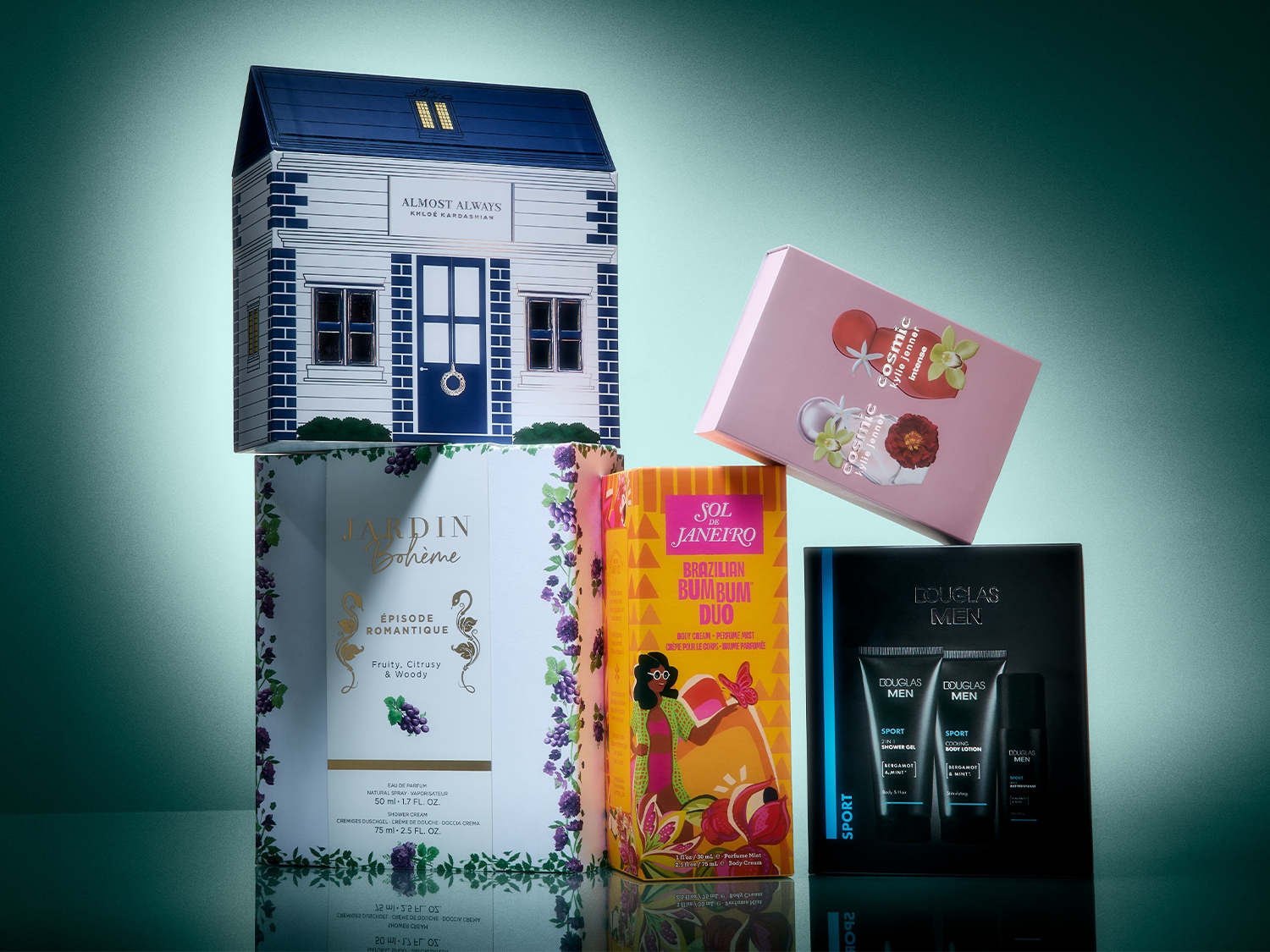 Ontdek een collectie van vier luxe geschenksets, waaronder een huisvormige doos van Khloé Kardashian, een roze doos van Kylie Jenner, een witte doos van Jardin Bohème en een gele doos van Sol de Janeiro, perfect voor elke gelegenheid.