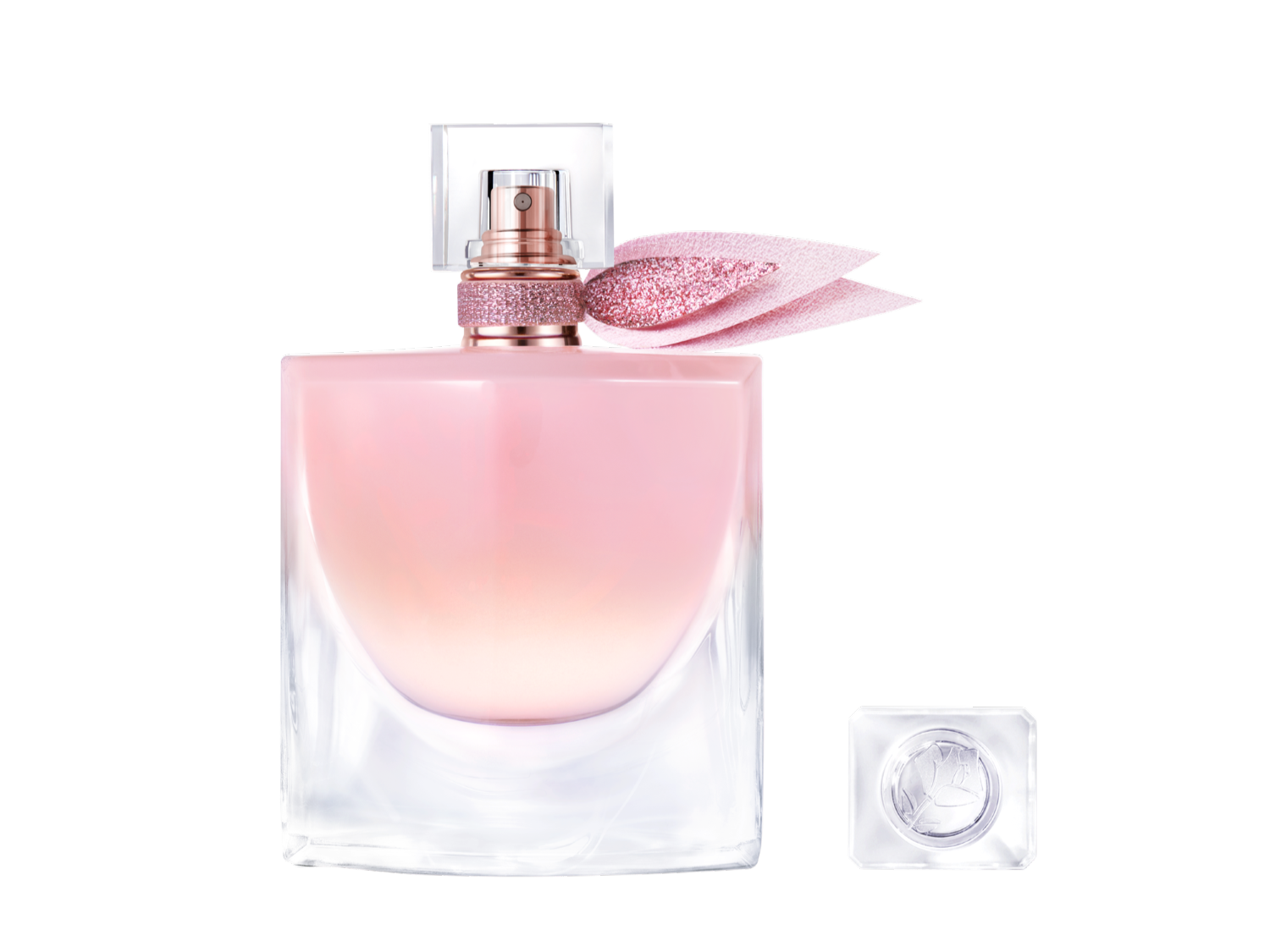 Der Lancôme La Vie Est Belle Vanille Nude Flakon ist aus klarem Glas gefertigt und enthält eine rosafarbene Flüssigkeit, die nach unten hin heller wird, mit einem glitzernden rosa Band um den Sprühkopf und einer abgenommenen Kappe daneben.