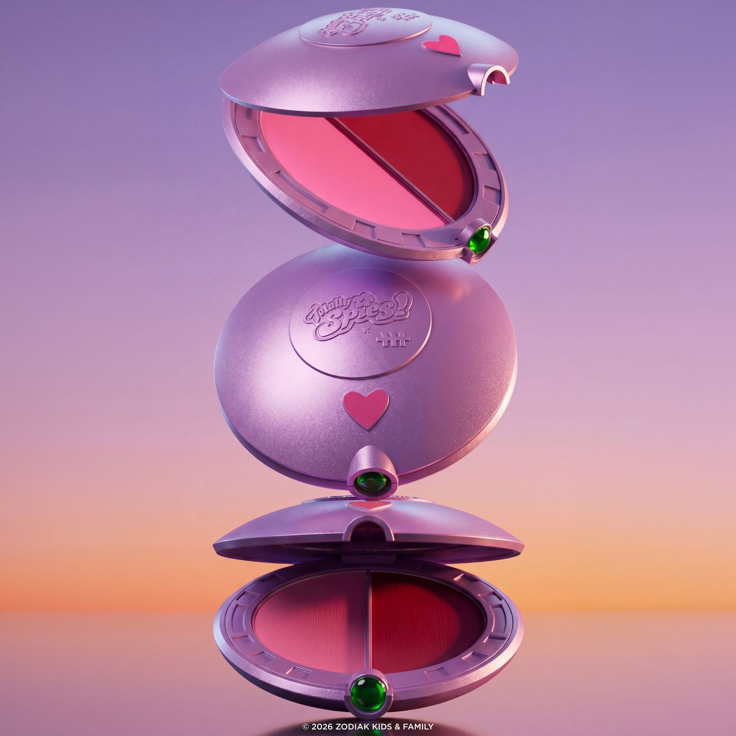 Découvrez le fard à joues Totally Spies en forme de soucoupe volante rose métallique, orné d'un cœur rose et d'un bouton vert, avec deux teintes de rose pour un look éclatant.