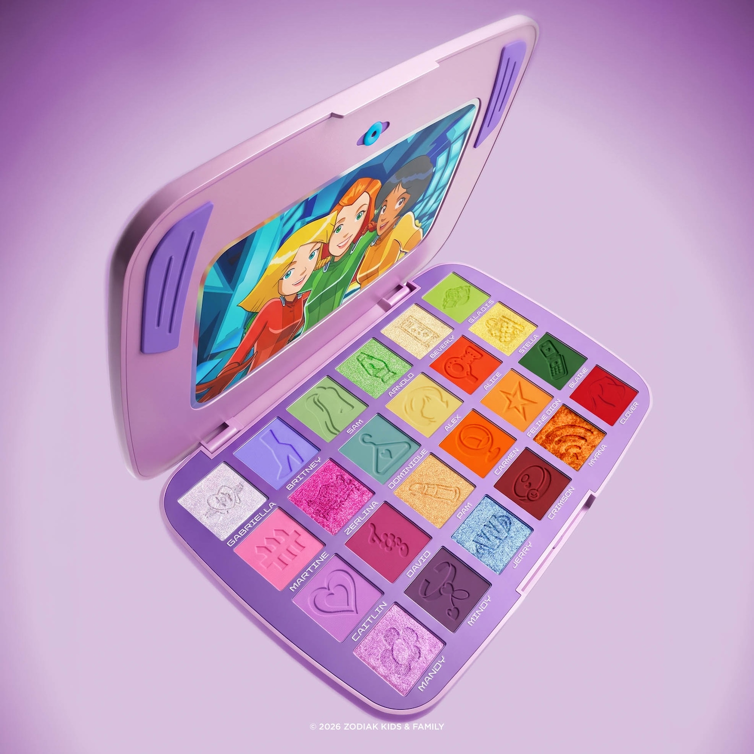 La palette de fards à paupières Totally Spies est un ensemble de maquillage violet en forme de tablette, avec un écran affichant les personnages de Totally Spies et 25 fards à paupières aux couleurs vives, chacun avec un nom de personnage ou un symbole.