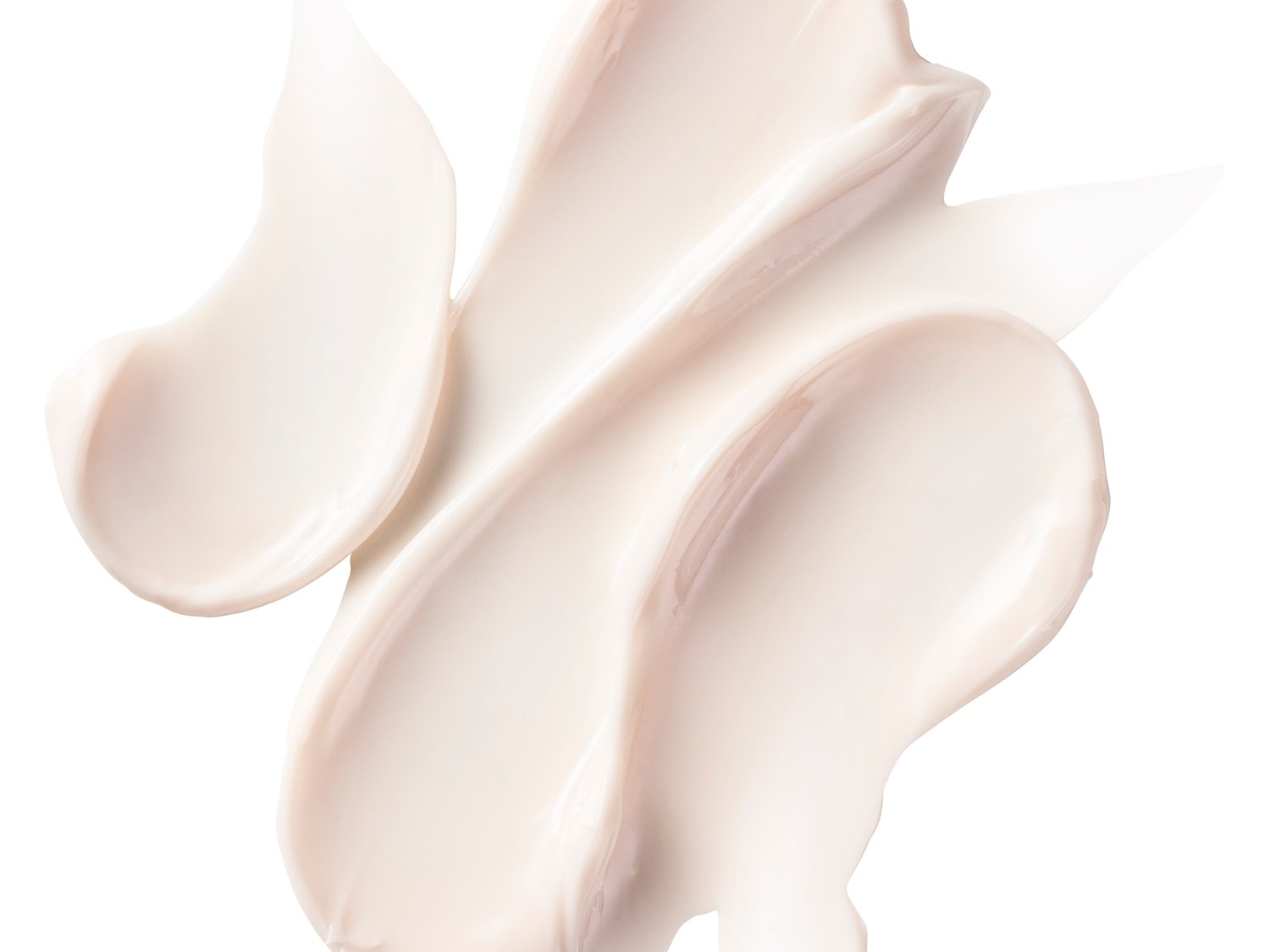 Kremowa konsystencja kosmetyku w odcieniu złamanej bieli, idealna do pielęgnacji skóry.