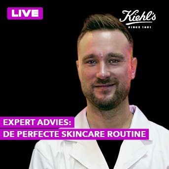 Een man in een witte jas lacht naar de camera, met de tekst 'Expert Advies: De Perfecte Skincare Routine' en het Kiehl's logo.