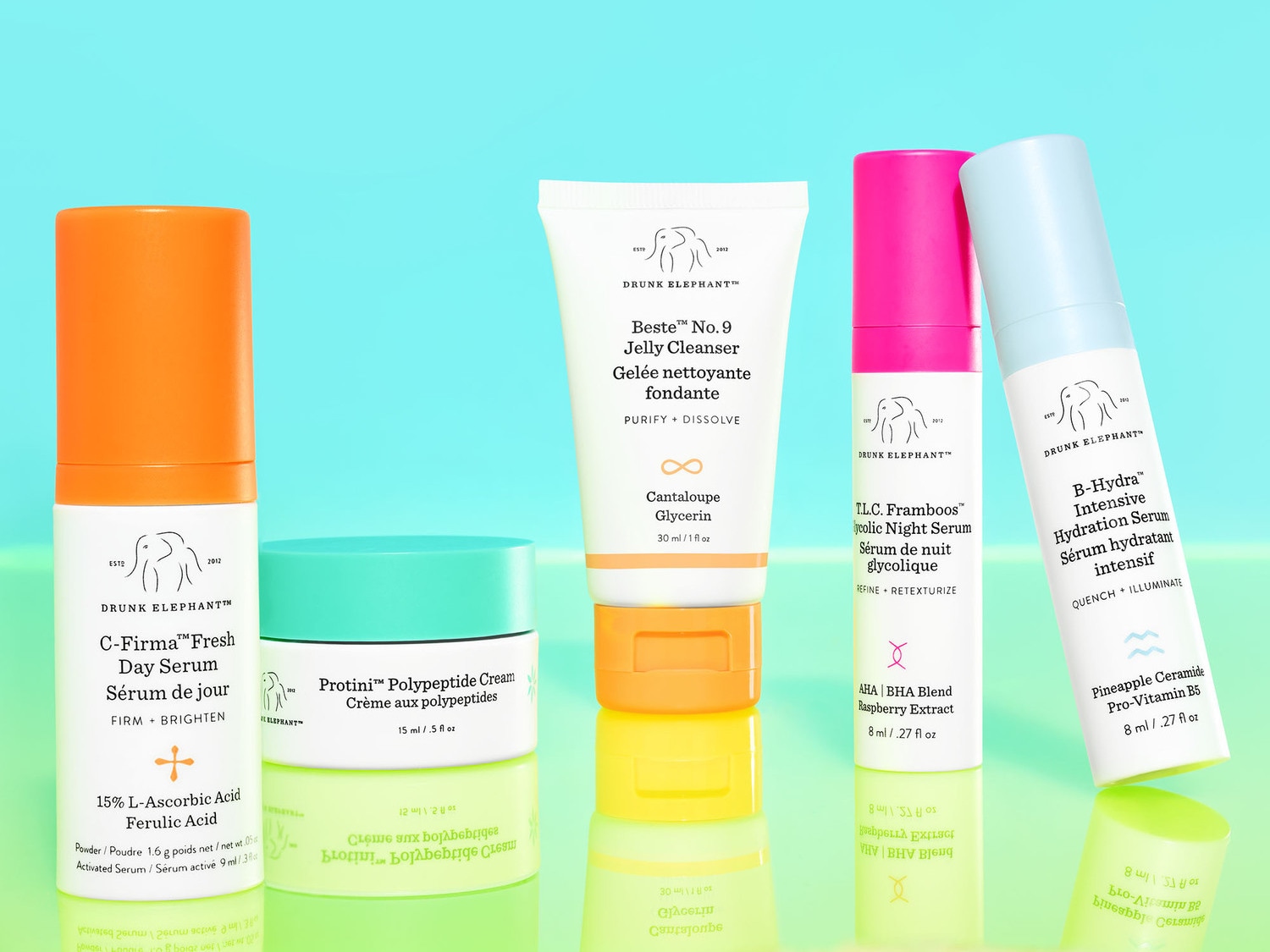 Drunk Elephant's collectie huidverzorgingsproducten omvat C-Firma Fresh Day Serum, Protini Polypeptide Cream, Beste No. 9 Jelly Cleanser, T.L.C. Framboos Glycolic Night Serum en B-Hydra Intensive Hydration Serum.