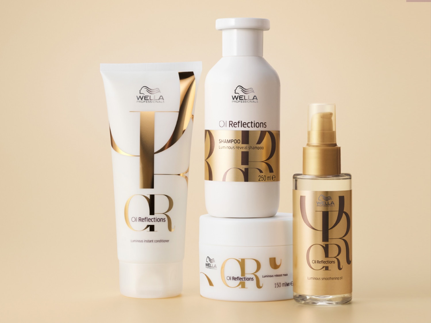 Kolekcja Wella Professionals Oil Reflections w białych opakowaniach ze złotymi akcentami, obejmuje odżywkę, szampon, maskę i olejek, zapewniając kompleksową pielęgnację włosów.