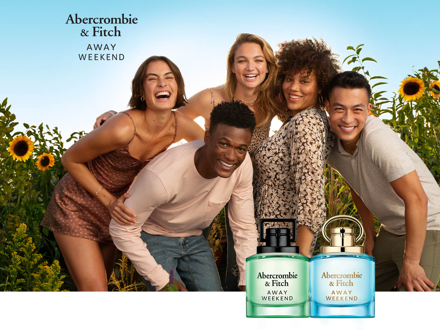 Na tle słoneczników i roześmianych przyjaciół, zielony i błękitny flakon perfum Abercrombie & Fitch AWAY Weekend obiecują świeży, radosny zapach.
