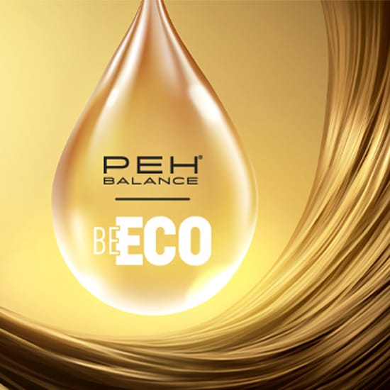 Złota kropla z napisem PEH Balance BE ECO na złotym tle z pasmem włosów.