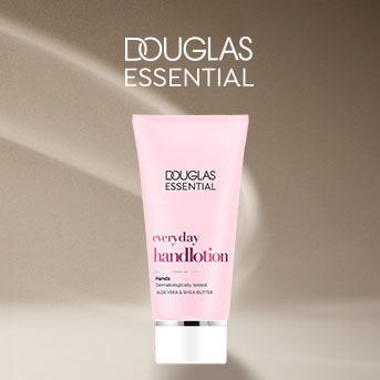 Różowa tubka balsamu do rąk Douglas Essential Everyday Handlotion z napisem, zawierająca aloes i masło shea.
