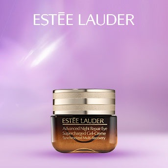 Estée Lauder Advanced Night Repair Eye Supercharged Gel-Creme in a brown jar with a golden lid, set against a gradient purple background.