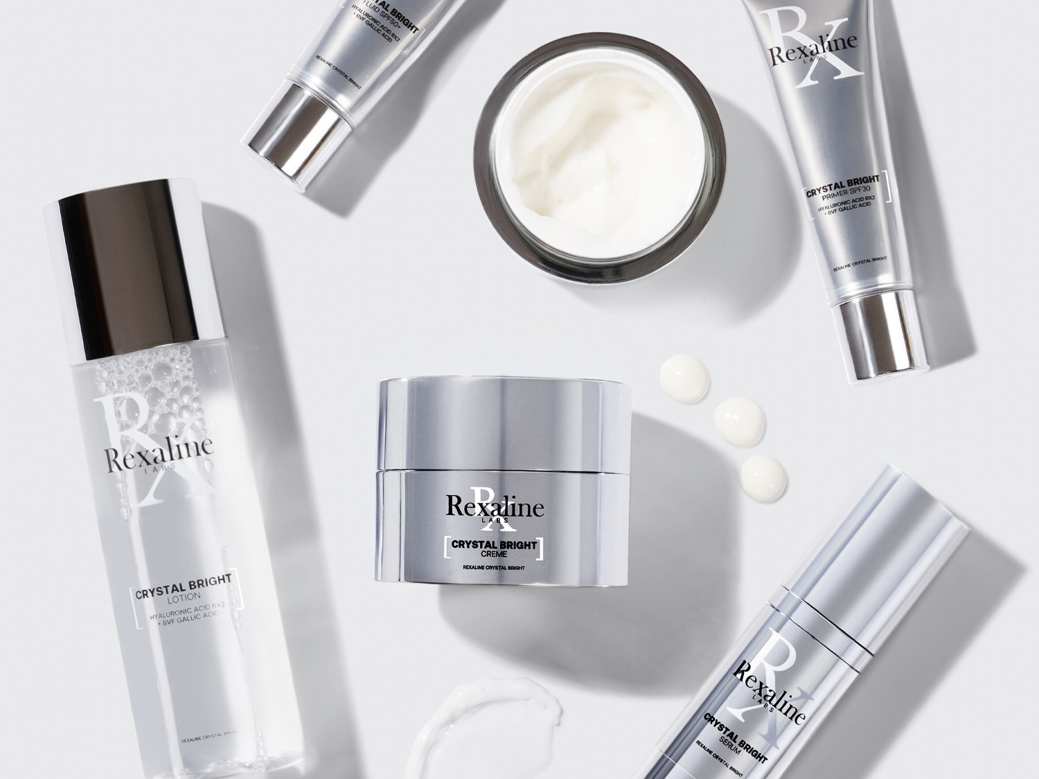 Entdecken Sie Rexaline Crystal Bright: Lotion, Creme, Primer und Serum für strahlende Haut mit Hyaluronsäure und Gallussäure.