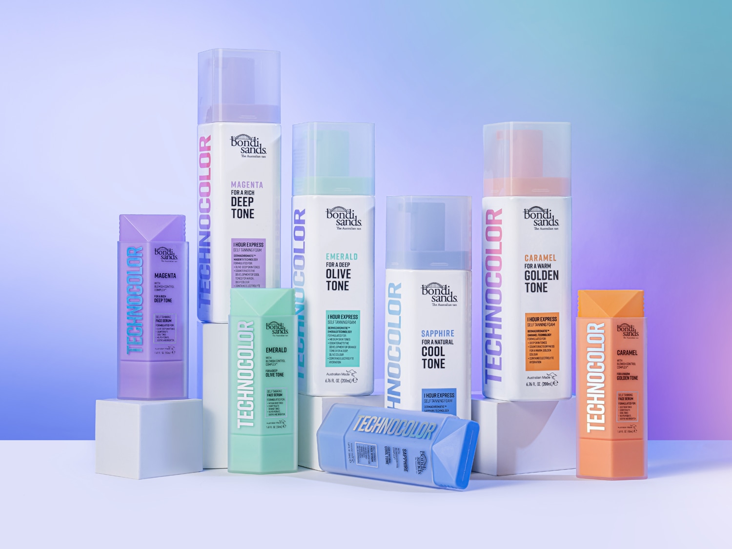 Farebná škála samoopaľovacích pien Bondi Sands Technocolor v odtieňoch magenta, smaragd, zafír a karamel pre rôzne tóny pleti.