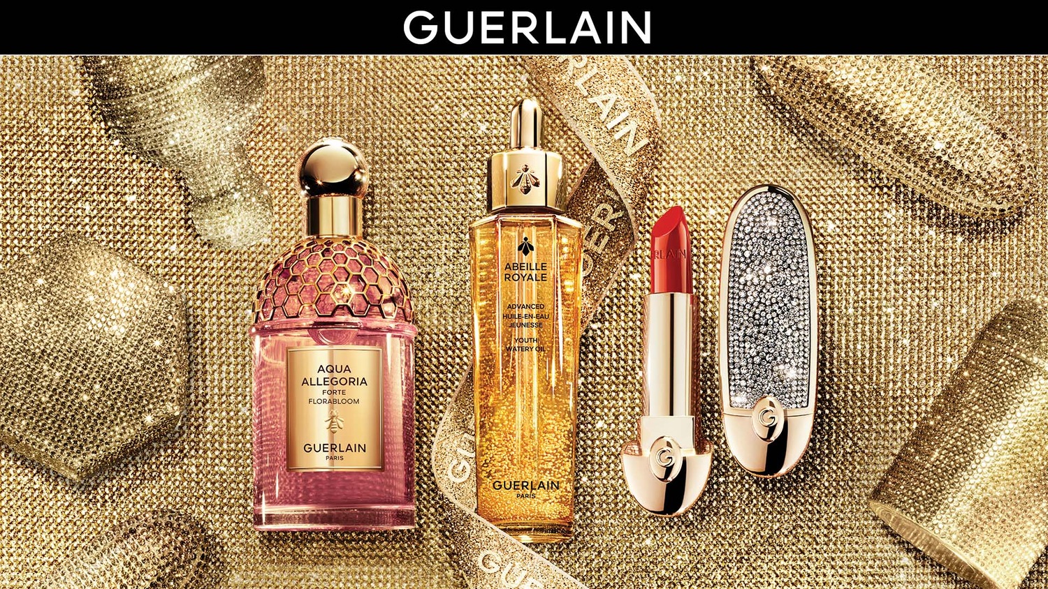 Découvrez le parfum Aqua Allegoria Forte Florabloom de Guerlain, un flacon rose aux détails dorés évoquant un rayon de miel.