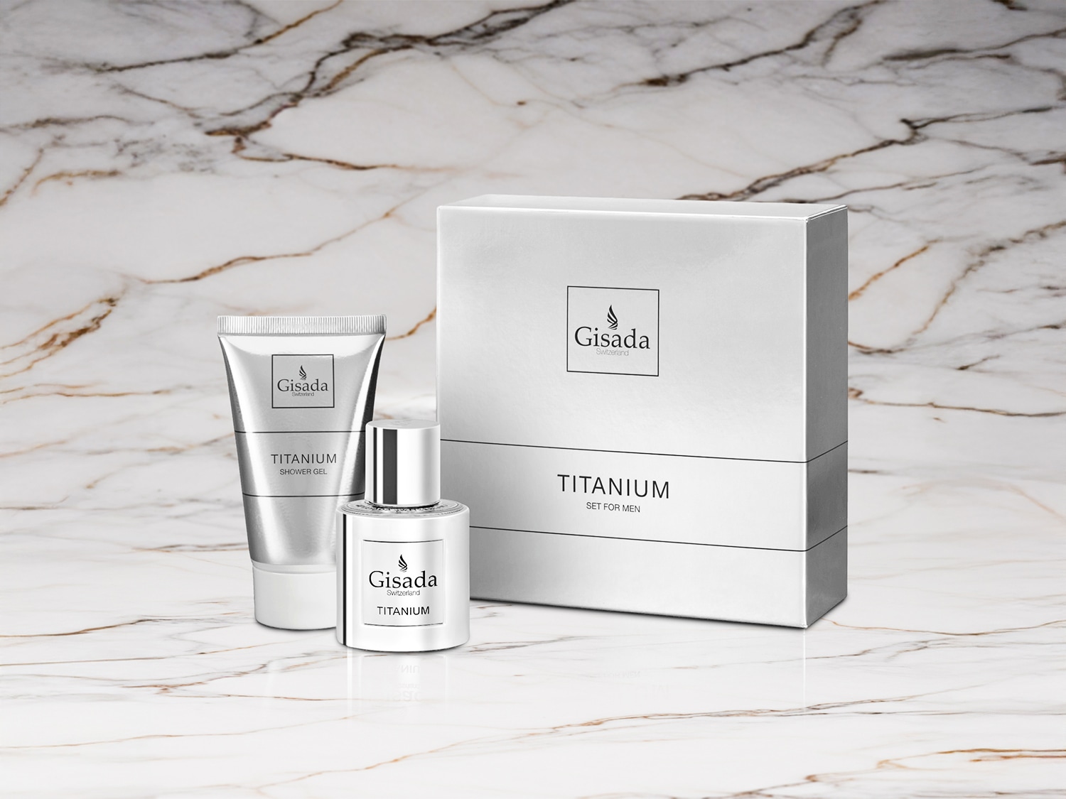 Das Gisada Switzerland Titanium Set für Männer präsentiert sich in einer eleganten silbernen Verpackung, bestehend aus Duschgel und Eau de Parfum.