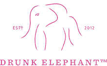 Rosa Logo von Drunk Elephant mit einem stilisierten Elefantenkopf und dem Gründungsjahr 2012.