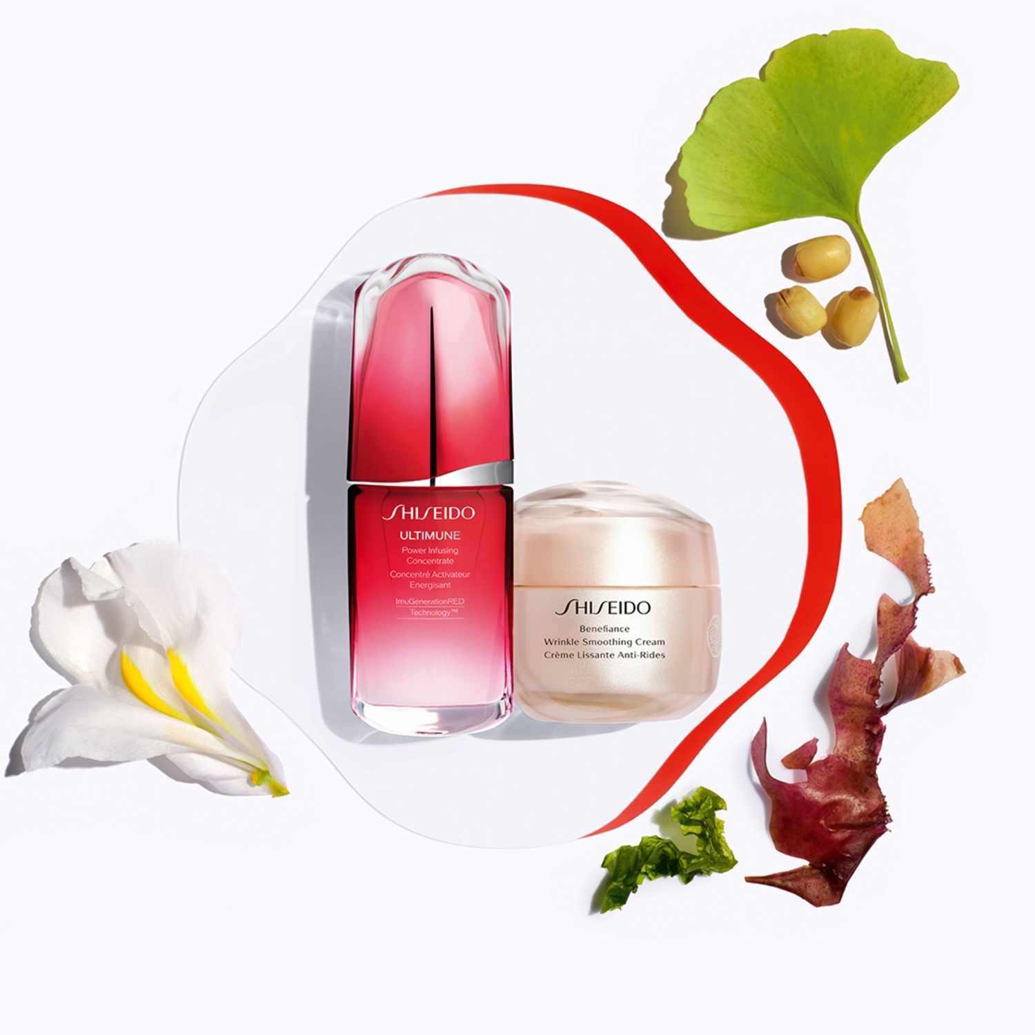 Twee Shiseido huidverzorgingsproducten, waaronder Ultimune Power Infusing Concentrate in een roze fles en Benefiance Wrinkle Smoothing Cream in een beige pot, omringd door botanische elementen.