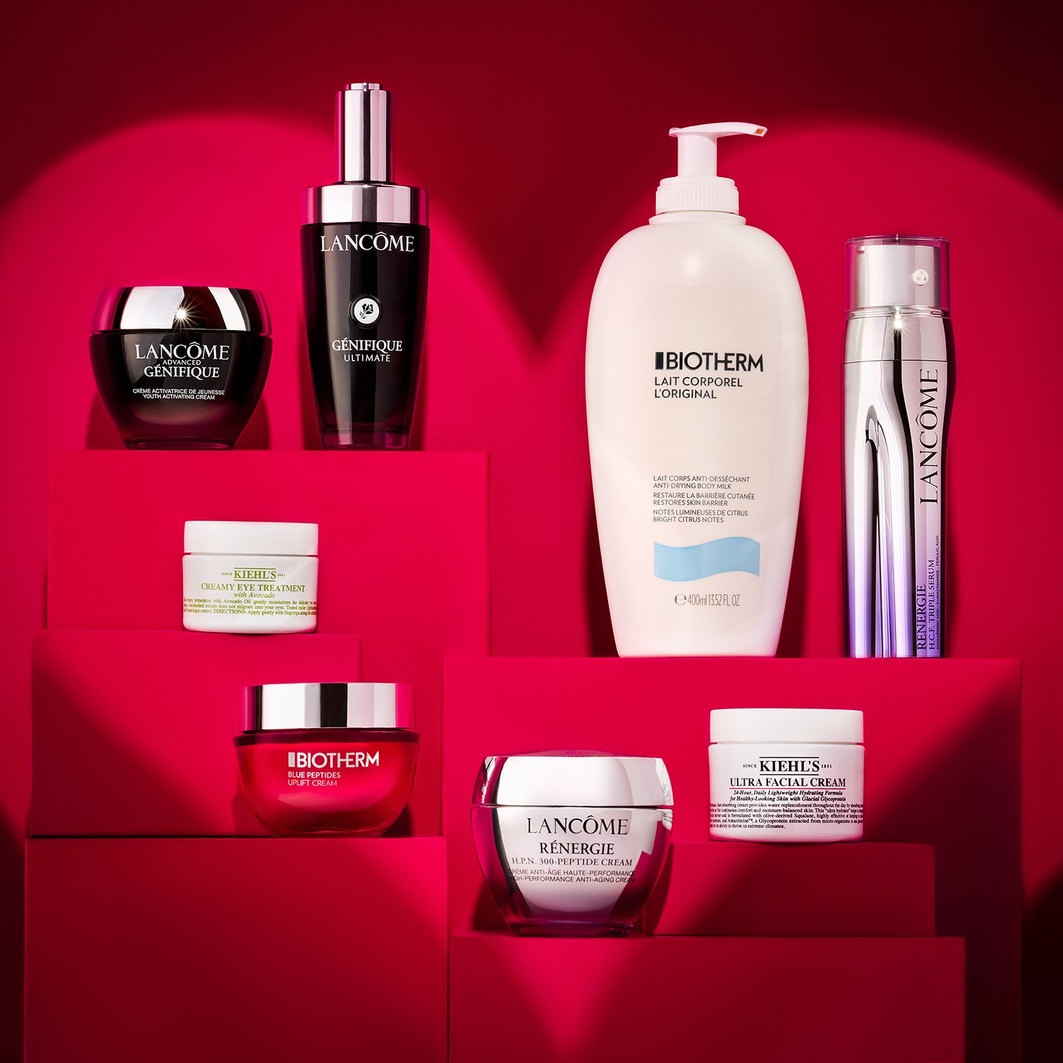 Découvrez une sélection de produits de beauté Lancôme, Biotherm et Kiehl's, présentés dans des emballages élégants et variés, allant des crèmes pour les yeux aux sérums anti-âge.