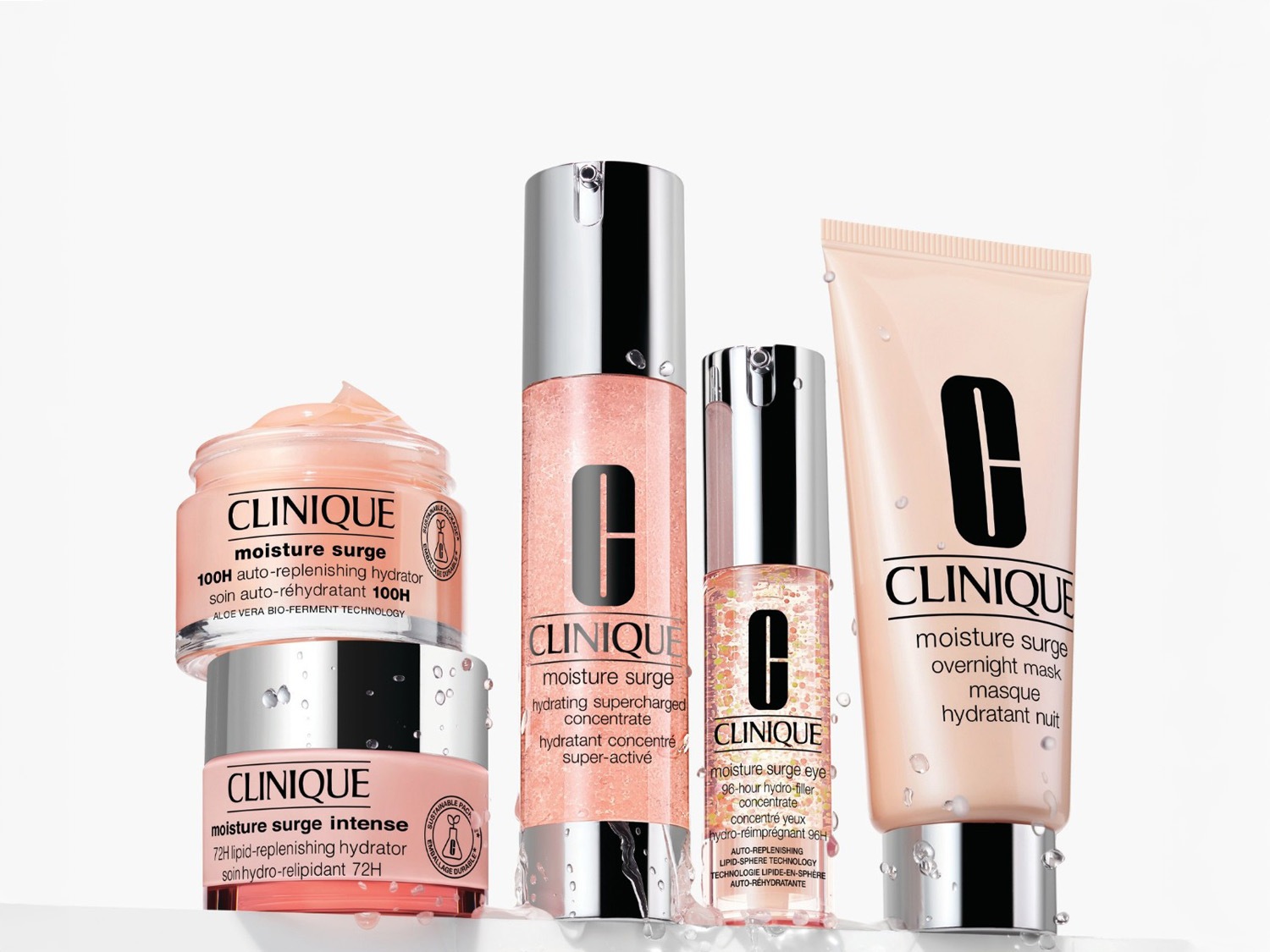 Kolekcja Clinique Moisture Surge w różowych opakowaniach: krem nawilżający 100H, koncentrat super-aktywny, żelowy koncentrat pod oczy i maska na noc dla intensywnego nawilżenia.