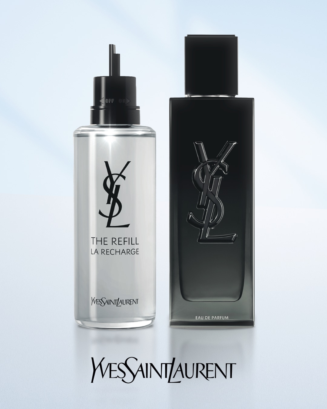 Yves Saint Laurent präsentiert ein Set mit einem schwarzen Eau de Parfum Flakon und einem durchsichtigen Nachfüllflakon mit dem YSL-Logo.
