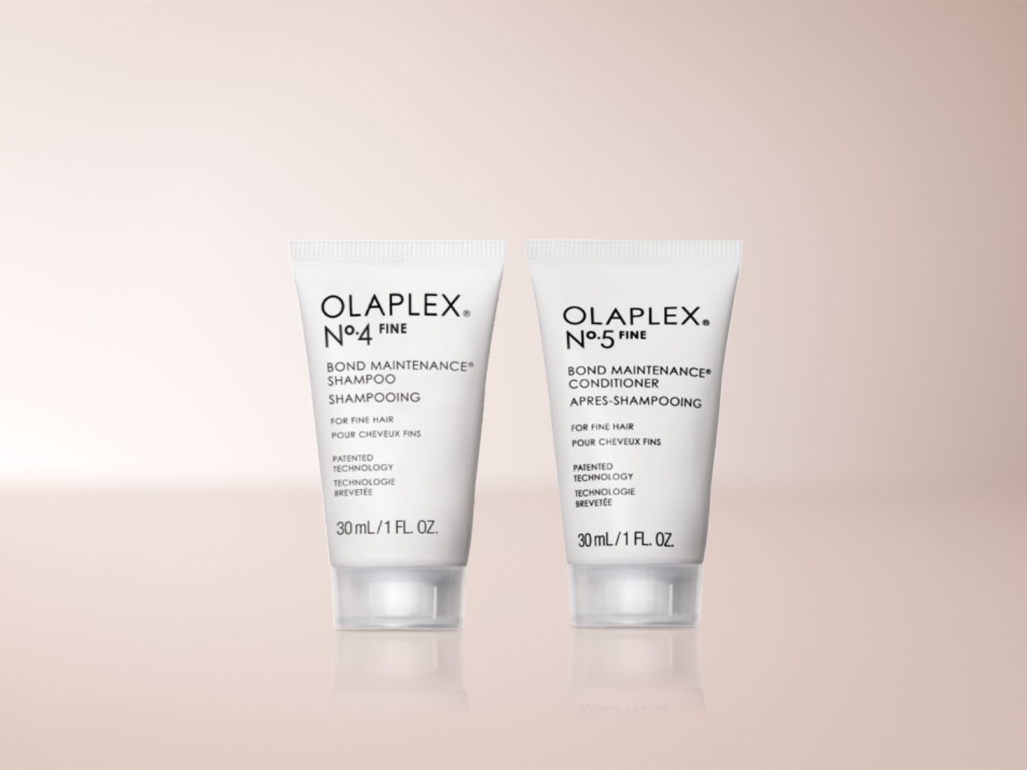 Das Bild zeigt zwei weiße Tuben Olaplex N°4 Fine Bond Maintenance Shampoo und N°5 Fine Bond Maintenance Conditioner, jeweils 30 ml, speziell für feines Haar.