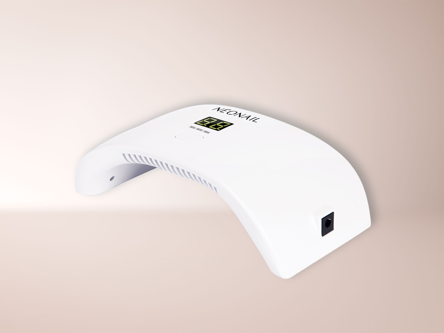 Eine weiße NEONAIL UV-Nagellampe mit digitalem Display und Timer-Funktion für die professionelle Maniküre zu Hause.