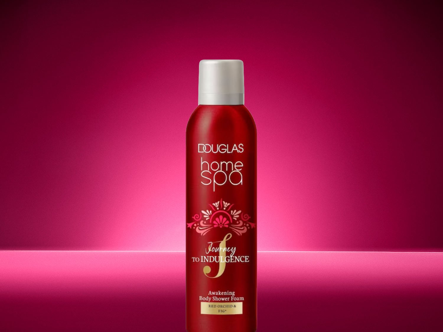 Douglas Home Spa Journey to Indulgence Awakening Body Shower Foam in a striking red metal bottle with a white cap, featuring red orchid and fig.